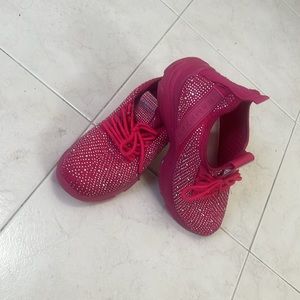 Pink sneakers with sparkles, bejeweled shoes perfect for a concert